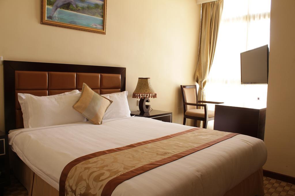 Caravan Hotel Аддис-Абеба Номер фото